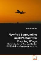 Flowfield Surrounding Small Photodriven Flapping Wings