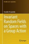 Invariant Random Fields on Spaces with a Group Action