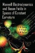 Maxwell Electrodynamics & Boson Fields in Spaces of Constant Curvature