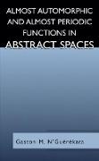 Almost Automorphic and Almost Periodic Functions in Abstract Spaces