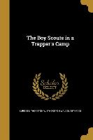 BOY SCOUTS IN A TRAPPERS CAMP