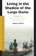 Living in the Shadow of the Large Dams: Long Term Responses of Downstream and Lakeside Communities of Ghana's Volta River Project