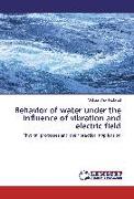 Behavior of water under the influence of vibration and electric field