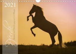 Pferde - Anmut und Stärke gepaart mit Magie (Wandkalender 2021 DIN A4 quer)