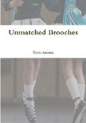 Unmatched Brooches