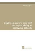 Double-slit experiments and decay probability in microwave billiards