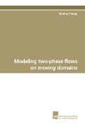 Modeling two-phase flows on moving domains