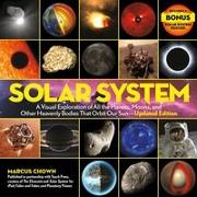 Solar System: A Visual Exploration of All the Planets, Moons, and Other Heavenly Bodies That Orbit Our Sun--Updated Edition