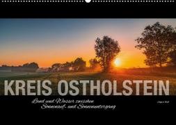 Kreis Ostholstein - Land und Wasser zwischen Sonnenauf- und Sonnenuntergang (Wandkalender 2023 DIN A2 quer)