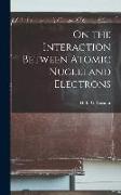 On the Interaction Between Atomic Nuclei and Electrons