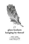 glass feathers hanging by thread